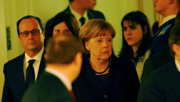 Ангела Меркель и Франсуа Олланд на переговорах нормандской четверки в Минске