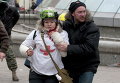 Раненная выстрелом в шею медсестра Олеся Жуковская во время столкновений на Майдане Незалежности 20 февраля 2014 года