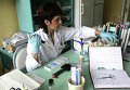 Лаборант в вирусологической лаборатории Роспотребнадзора, архивное фото