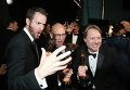 Крис Уильямс, Рой Конли и Дон Холл (слева направо) за кулисами премии Оскар, 22 февраля 2015