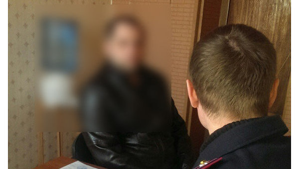 Задержанный участник штурма Харьковской ОГА 1 марта 2014 года.
