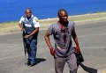 Окровавленный участник акции протеста в Йоханнесбурге