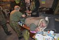 Раненые украинские военные  в результате обстрела Песок