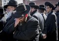 Похороны  детей из семей ортодоксальных евреев, погибших в районе Нью-Йорка, Бруклине, США, в результате пожара