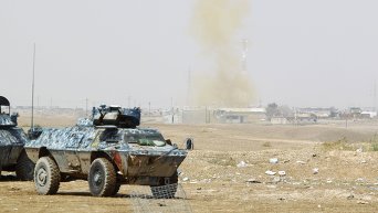 Военная техника иракских сил безопасности в наступлении на Тикрит