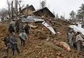 Разрушительные последствия наводнения и оползней в Кашмире