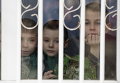 Мальчики выглядывают из окна детского дома в Харцызске, 7 Марта 2015 г