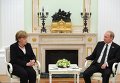 Владимир Путин и Ангела Меркель во время встречи в Кремле