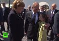 Меркель и Путин фотографируются с детьми