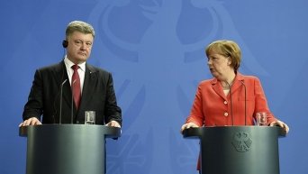 Петр Порошенко и Ангела Меркель в Берлине