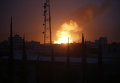 Дым от пожара после авиаудара по одному из крупнейших складов оружия на окраине столицы Йемена Саны