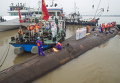 Спасатели на затонувшем круизном лайнере Восточная звезда в Цзюаньли, провинция Хубэй, Китай