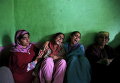 Оплакивающие погибших при оползнях в Индии женщины