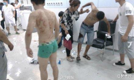 Пострадавшие в результате взрывов и пожара в Тяньцзине (Китай)