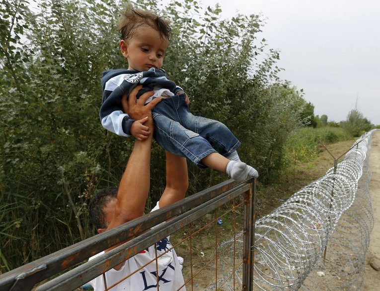 Беженцы из Сирии на сербско-венгерской границе