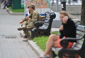 Люди в военной форме на улицах Киева