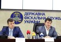 Первый замглавы ГФС Сергей Билан и глава ГФС Роман Насиров (справа)