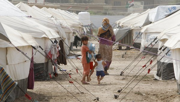 Иракские суниты в лагере беженцев в Багдаде.