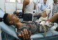 Житель города Таиз раненый во время уличных боев в Йемене