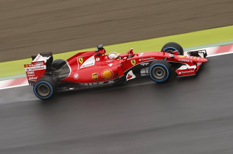 Немецкий пилот Ferrari Формулы 1 Себастьян Феттель в ходе первой сессии по Suzuka, Япония, в преддверии воскресного японского Гран-при F1.