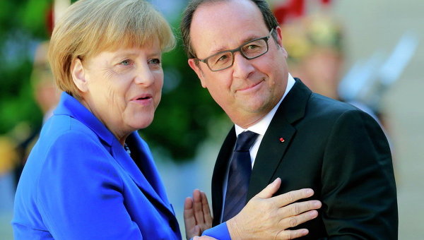 Канцлер Германии Ангела Меркель и президент Франции Франсуа Олланд на встрече нормандской четверки в Париже