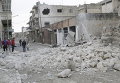 После авиаудара ВВС России по контролируемому повстанцами городу Маарет аль-Нуман в провинции Идлиб, Сирия