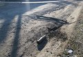 Разрушения и остатки разорвавшихся боеприпасов в Сватово после пожара в арсенале