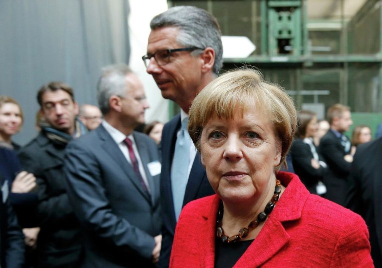 Президент Федерации немецкой промышленности Ульрих Грилло и канцлер Ангела Меркель.