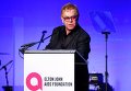 Элтон Джон выступает на ежегодной конференции Фонда по борьбе со СПИД имени Э.Джона в Нью-Йорке.